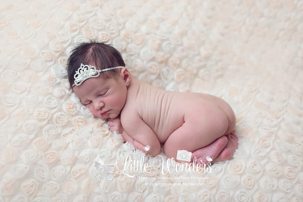 kingwood newborn photographer-baby in rhinestone tiara