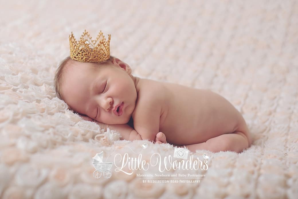 Kingwood Newborn Photography- Baby in a gold crown.